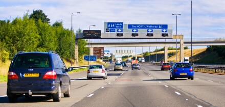 Motorway traffic in the UK. Cars driving on British motorways in England