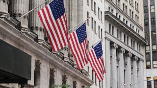 American flags at wallstreet, The New York Stock Exchange on Wall Street, NYC, lower Manhattan, United states.