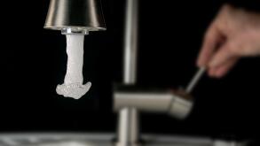 high speed image - beginning water outlet out of a tap