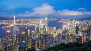 Night skyline of Hong Kong and Victoria Harbour from The Peak on a clear day