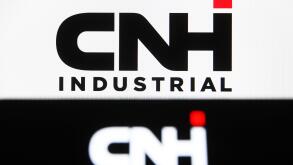 In this photo illustration, CNH Industrial logo seen displayed on a smartphone and a pc screen. (Photo by Pavlo Gonchar / SOPA Images/Sipa USA)