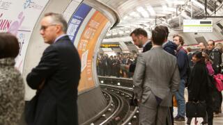 Crowded platform at tube station on London underground tube network London
