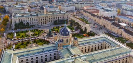A magnificent aerial shot of Vienna?s MuseumsQuartier, featuring the Kunsthistorisches Museum and lush gardens, showcasing architectural brilliance an