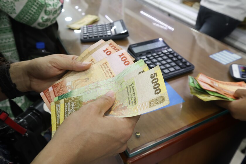 Sri lanka money currency exchange-adobe-2022