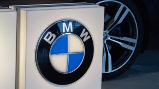 A luxury BMW sports car exhibited at the Brussels Zaventem Airport in Belgium.