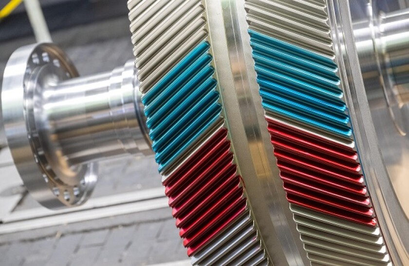 Augsburg, Germany. 08th May, 2023. The teeth of a gear are partially painted at the Renk company. Renk produces and services gearboxes at its Augsburg site with around 1600 employees, primarily for military use. Credit: Stefan Puchner/dpa/Alamy Live News