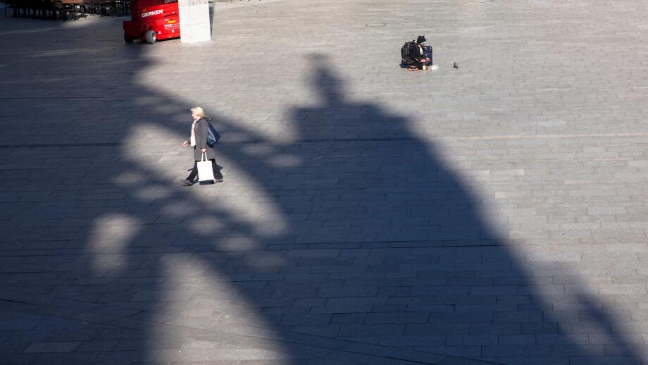 Coronavirus / Covid 19 outbreak, March 24th. 2020. Only few people on the square in front of Cologne central station, shadow of the cathedral, Germany
