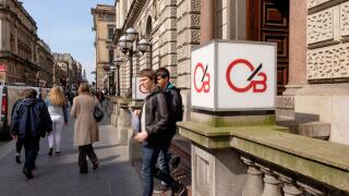Customers leaving the entrance to Clydesdale Bank, Glasgow, Scotland, UK