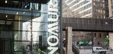 Signage outside Nomura International Plc, One Angel Lane, Bishopsgate, City of London, EC4, England, U.K.