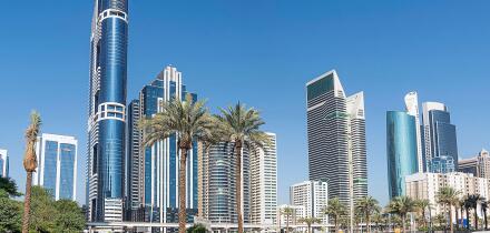 Tall skyscrapers against the blue sky. Dubai. UAE