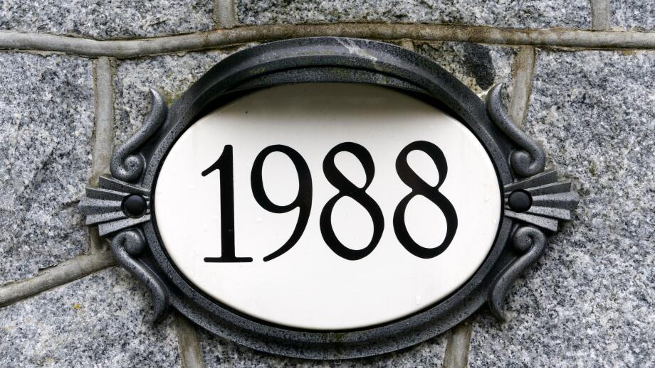 1988 house number on ornate oval plaque