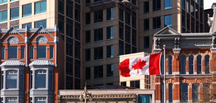 Flying in the wind flag of Canada. Downtown Ottawa, Ontario, Canada.