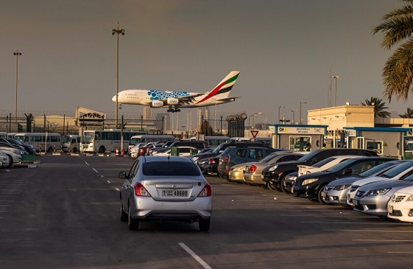 Emirates Airways; Airbus landing in Dubai international airport terminal 2