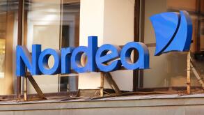 Stockholm, Sweden - August 2, 2013: Closeup of the Nordea bank office sign above the entrance at the office in downtown Stockholm.