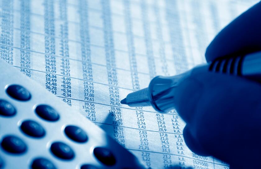 Pen marking stock prices, financial markets, stock exchange