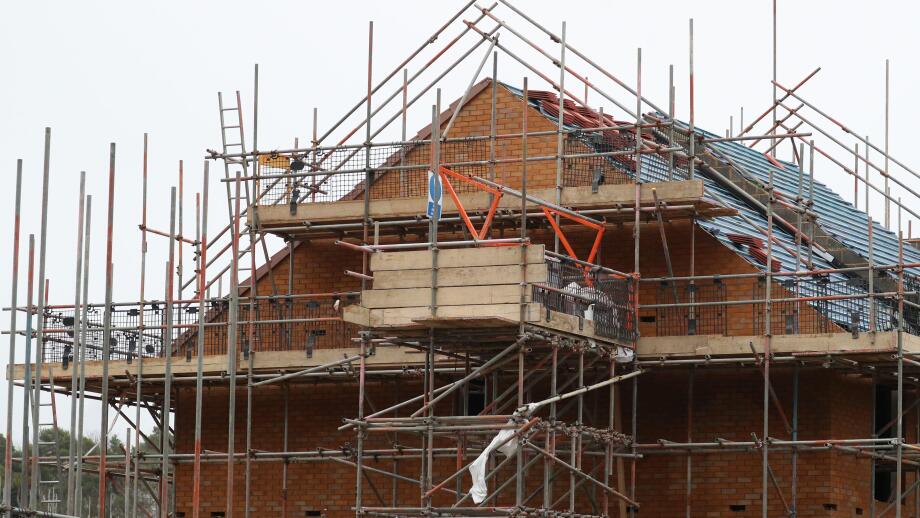File photo dated 07/01/20 of houses under construction on a housing development in Basingstoke, Hampshire. The UK's construction sector saw growth ease back last month after striking a two-year high in September, according to new data. It was partly drive