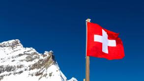 Swiss flag at the top of Jungfraujoch Plateau, Jungfrau Peak, Switzerland