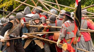 Push of pike where two opposing columns of pikemen meet and become locked in position. English civil war reenactment, Siege of Basing House 16.09.23