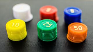 Close up of colored stacked casino chips
