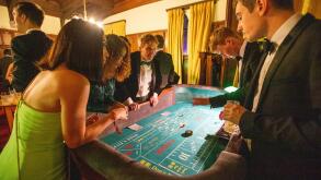 Picture dated June 18/19th shows students in the casino at the St Johns' May Ball in Cambridge.

Pictures offer a rare glimpse inside the lavish St Johns' May Ball, now the highlight of the social calendar at Cambridge University and headlined by Pixie Lo