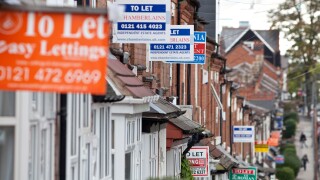 House for sale signs and to let signs on terraced homes in the Selly Oak area of Birmingham, England, UK