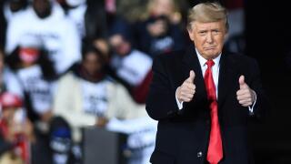 U.S. President Donald Trump gives a thumbs up after speaking at a Republican National Committee Victory Rally in support of incumbent Republican Senate candidates Sen. Kelly Loeffler (R-GA) and Sen. David Perdue (R-GA) at the Dalton Regional Airport.