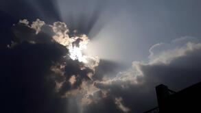 Sun coming out of the clouds