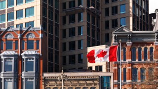 Flying in the wind flag of Canada. Downtown Ottawa, Ontario, Canada.
