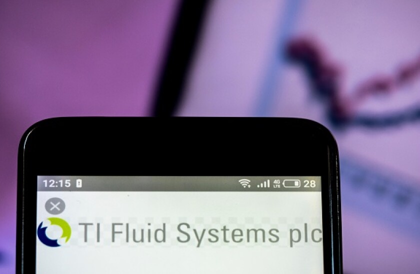 In this photo illustration a TI Fluid Systems logo seen displayed on a smart phone.