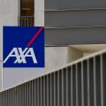 St. Gallen, Switzerland - 14th April 2021 : AXA insurance company sign hanging in front of a office in St. Gallen. AXA is a French multinational insur