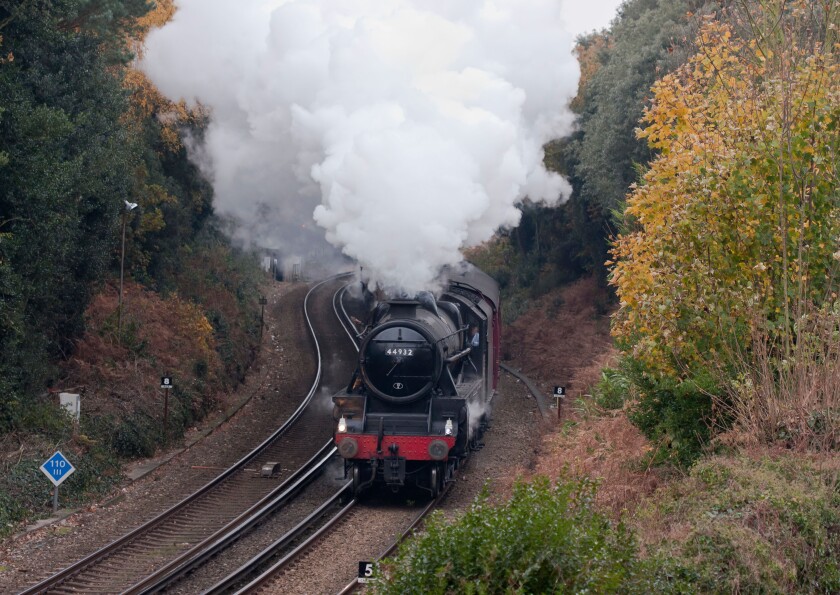 Steam Train under full power, approaching Bournemouth on the Weymouth to Waterloo Line, Dorset, England, UK.. Image shot 2010. Exact date unknown.