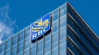 Business logo or sign of the Royal Bank of Canada (RBC) in a skyscraper by the city waterfront in Toronto, Canada