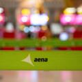 Madrid, Spain. 10th Apr, 2025. The Aena logo, the state-owned airport service management company, is visible on a barrier tape in the departure hall of Adolfo Suarez Madrid-Barajas Terminal 4 in Spain. (Photo by Xavi Lopez/SOPA Images/Sipa USA) Credit: Si