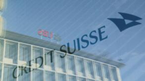 Logos of Swiss banks UBS and Credit Suisse are seen in Zurich, Switzerland March 20, 2023. REUTERS/Denis Balibouse