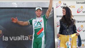 Norway cyclist Thor Hushovd of the Credit Agricole team celebrates his yellow jersey on the podium after the fourth stage of the Spanish Vuelta from Almendralejo to Caceres, southern Spain, Tuesday, Aug. 29, 2006. German rider Erik Zabel of the Team Milra