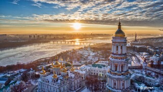Orange sunset and cloud over cityscape Kiev, Ukraine, Europe