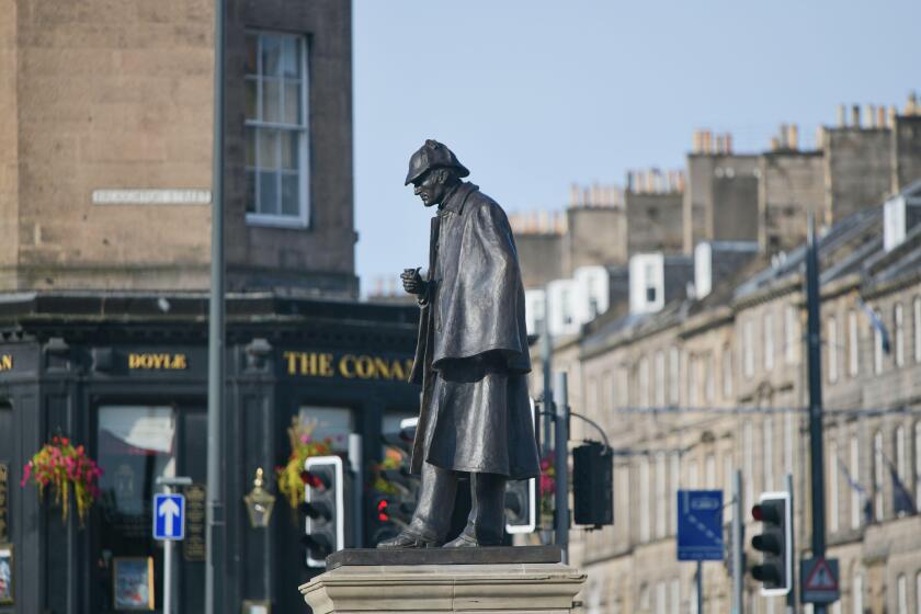 Edinburgh Scotland, UK 02 October 2023. The Sherlock Holmes statue at Picardy Place which marks the birthplace of writer Sir Arthur Conan Doyle. credi