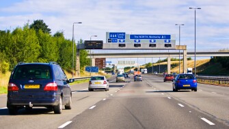Motorway traffic in the UK. Cars driving on British motorways in England