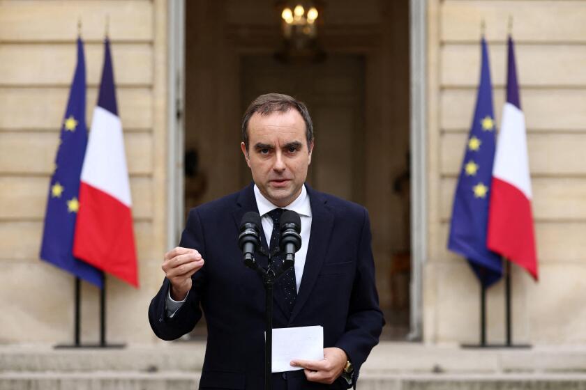 French outgoing Prime Minister Sebastien Lecornu, who resigned just a day after naming his government, delivers his statement at the Hotel Matignon in Paris, Monday, Oct. 6, 2025. (Stephane Mahe/Pool via AP)