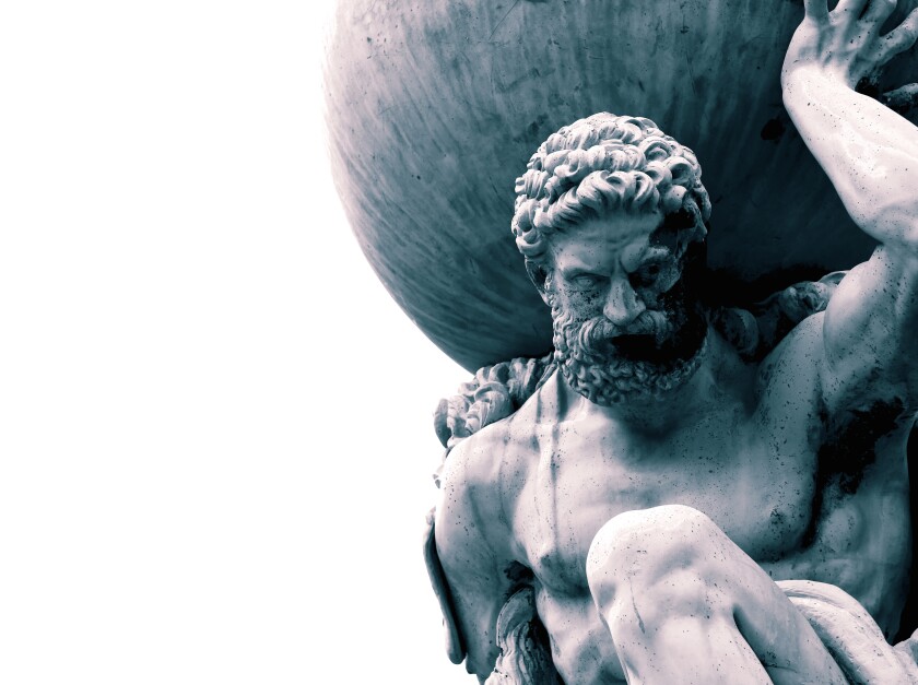 Statue of the Greek God Atlas holding the globe on his shoulders