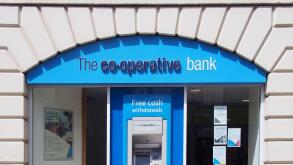 Sign and logo above the entrance of the co-operative bank on commercial street in leeds city centre