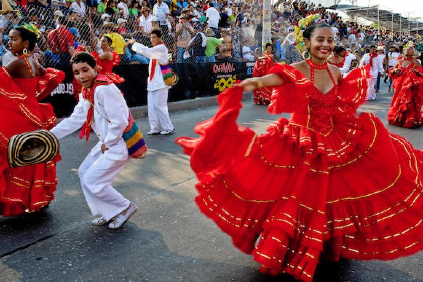 Colombian couple dance cumbia during the Carnival in Barranquilla, Colombia, LatAm, 575
