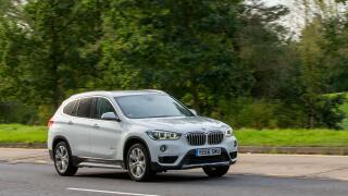 Milton Keynes,UK - Oct 16th 2023: 2016 white BMW X1  driving on an English road.