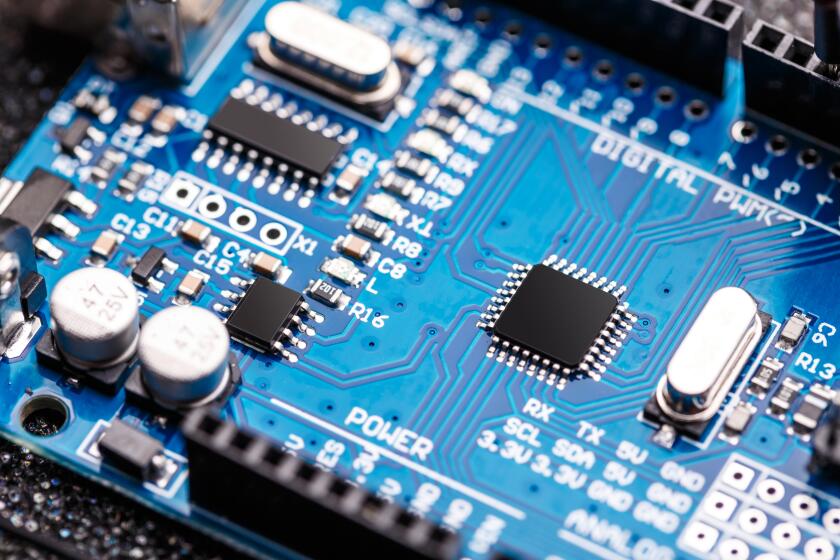 Integrated semiconductor microchip/ microprocessor on blue circuit board