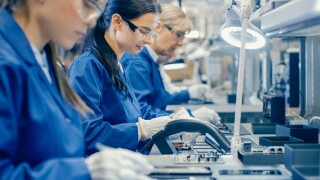 Women work factory electronics industry transition from Adobe 21Sep20 575x375