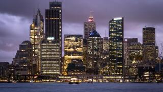 Twilight over the Sydney downtown district skyline by the Sydney harbor in Australia largest city.