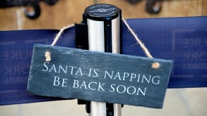 London, England, UK. 'Santa is Napping' sign outside Santa's Grotto Chelsea