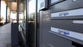 In this Monday Oct. 3, 2011 photo a view of the entrance of the European Financial Stability Facility office in Luxembourg, is seen Monday Oct. 3, 2011. After the Oct. 23 summit of EU leaders, the EFSF will wield massive financial power to contain the eur