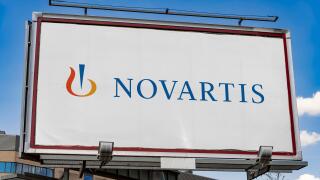 Advertisement billboard displaying logo of Novartis