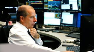 A trader works during the initial public offering (IPO) of German defense supplier Hensoldt AG at the Frankfurt Stock Exchange in Frankfurt, Germany, September 25, 2020. REUTERS/Ralph Orlowski